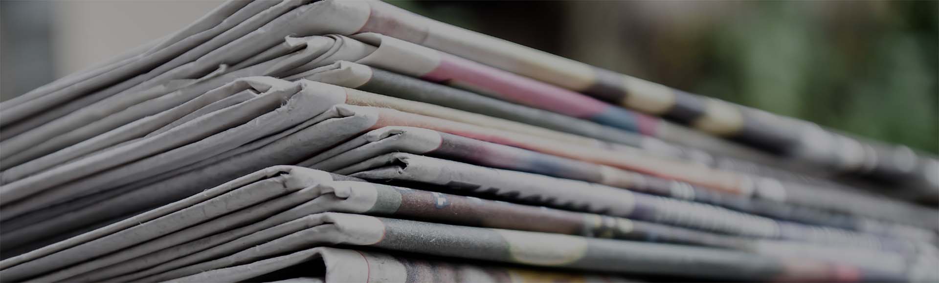 A Stack of Newspapers